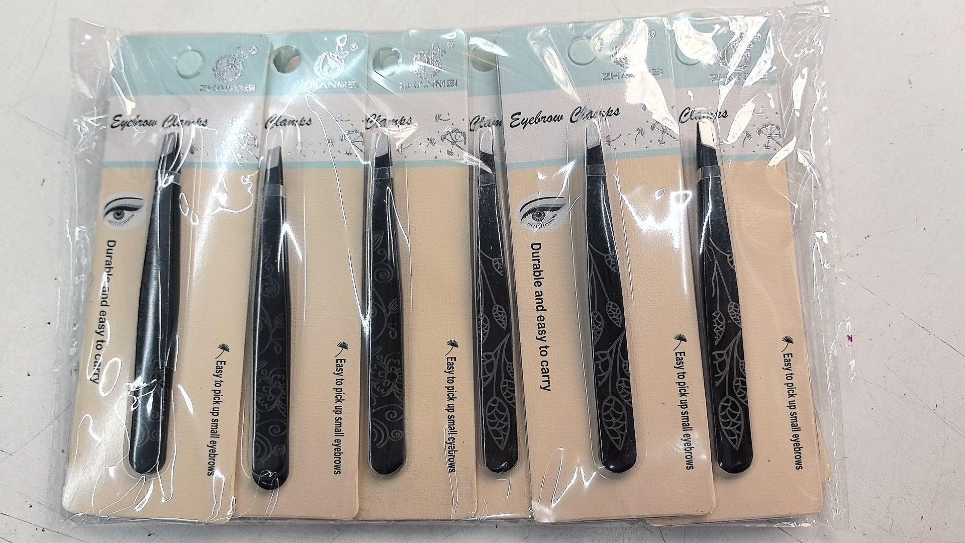 Pinces a sourcils (x12)