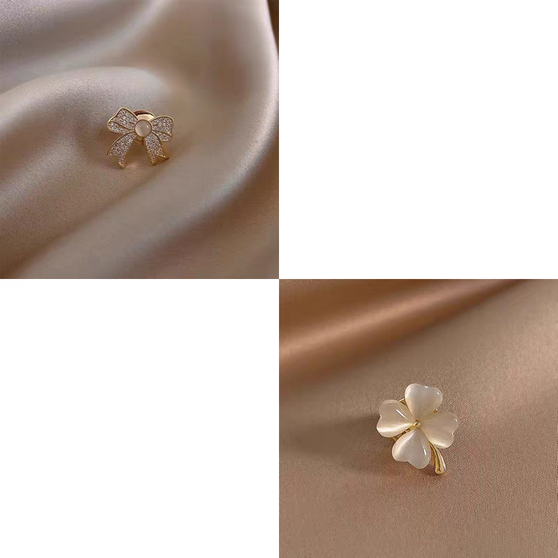 Petit broche en métal avec motif mélange (x12)