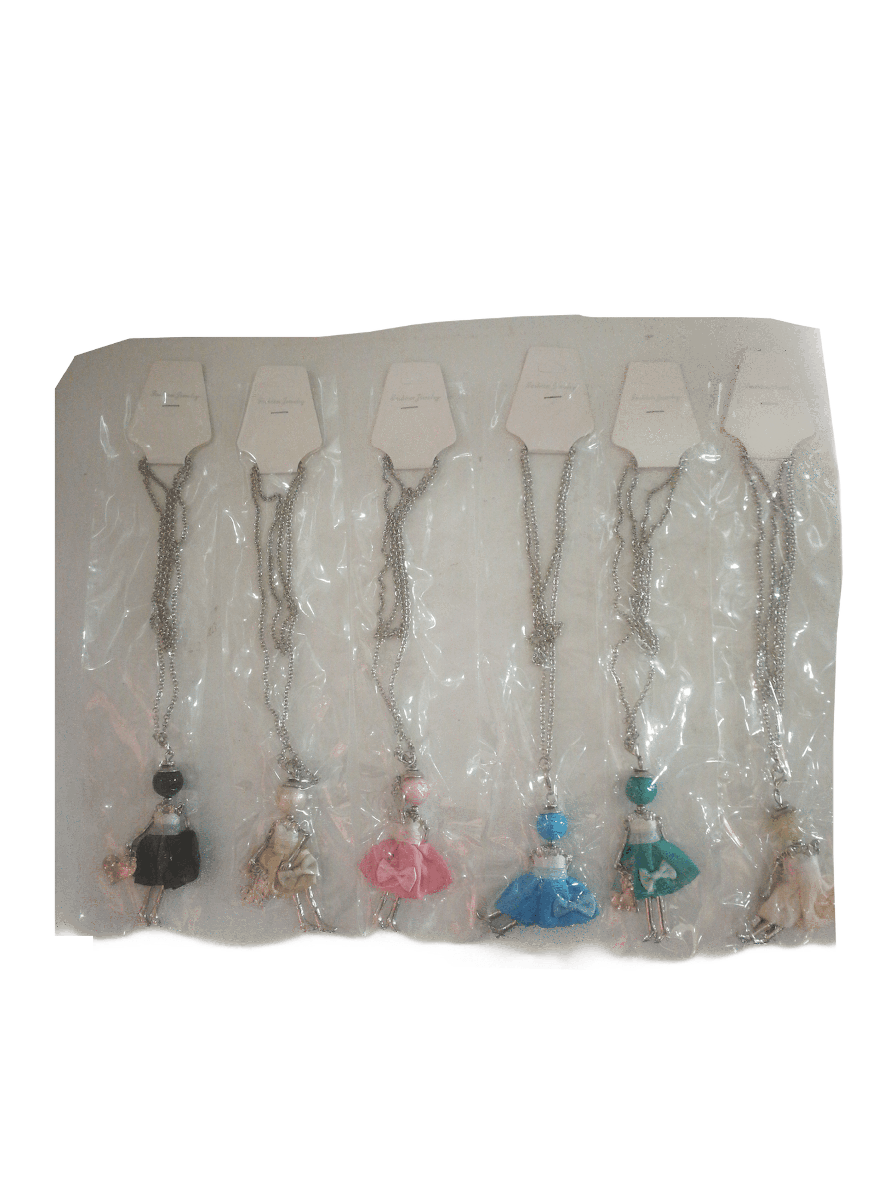 DESTOCKAGE Colliers sautoir pendentif poupée robe (x12) 1,50€/unité | Grossiste-pro